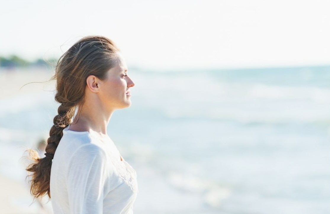 Individual engaging in peaceful outdoor mindfulness reflection in Australian nature